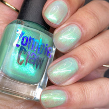 "Armyverse" has a mint green base with electric blue-green shimmer.

13ml Bottle
