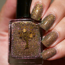 "He's More Myself Than I Am" has pink/gold/green shimmer with pink reflective glitter.

12ml Bottle