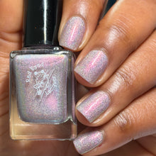 "Janet and Rita" is a light purple super holo with pink/gold shifting shimmer.

12ml Bottle