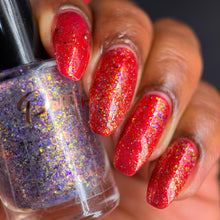 "Broken Princess" has a red base with red/gold aurora shimmer.

"Emeraude Reborn" has a mix of iridescent flakies and purple metallic micro flakies.

10ml Bottles