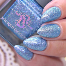 "Bubbles" is a light blue polish with holo shimmers.

15ml Bottle