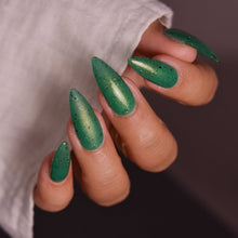 "Princess Nashu" is a bright grass green with yellow shimmer, black flakes, and micro holographic flakes.

15ml Bottle&nbsp;