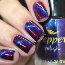"Blue Lava" has a purple base with pink/orange shimmer and blue magnetic pigment.

10ml Bottles
