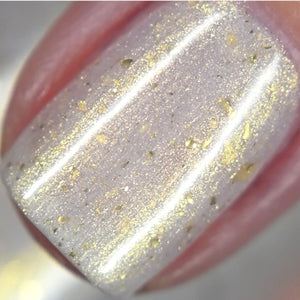 Penelope Luz continues their 'Goddesses of Mythlogy' with a polish inspired by Amaterasu!

"Amaterasu" has a white crelly base with gold shimmer and flakies.