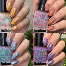 For Halloween, BCB Lacquers has created a duo inspired by Halloweentown!

"Mortals See, Mortals Do" is a SOLAR polish that shifts yellow(indoor) to a soft pink(in direct outdoor light) or a maroon(only with the use of a UV/Blacklight) with pink/orange/gold glass flakes and purple/red/blue multichrome flakes.&nbsp;

"Bubble, Bubble, Toil, And Trouble" is a SOLAR polish that shifts grey(indoor) to purple(outdoor) with purple/blue/green glass flakes and purple/blue/green multichrome flakes.