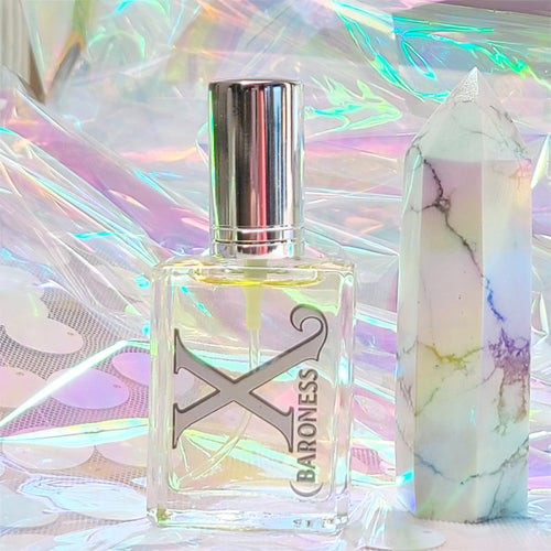 Baroness X continues their 'Tarot Card' series with a unisex parfum inspired by The Temperance card, which represents the blending of different elements to create a harmonious whole, much like this fragrance combines citrus, fruit, floral, and earthy notes. It’s about moderation and finding balance, reflecting the way the scent balances masculine and feminine aspects.

This scent is a unisex version of the women's Guilty perfume by Gucci.
This unique fragrance oil is a wonderful blend of fruit, citrus, pine