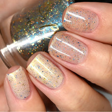 Penelope Luz continues their 'Goddesses of Mythlogy' with polishes inspired by Amaterasu!

"Amaterasu" has a white crelly base with gold shimmer and flakies.

"Sun Goddess" has blue flakes with gold holo glitters.