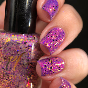 Penelope Luz has created a duo for Halloween!&nbsp;

"Welcome Ghosts!" is a vibrant purple crelly with orange/gold shimmer.

"Have a Dinner With Us!" has orange and purple flakies with black glitters.