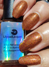 Lilypad Lacquer continues their theme inspired by 'The Bangles' with "Crash and Burn."

"Crash and Burn" is a coppery orange scattered holo.

12ml Bottles

Cap TBD