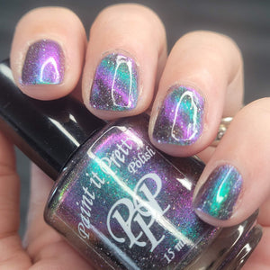 Paint It Pretty continues the What do you call these? series with "Lollipops or Suckers" which is a magnetic polish with holographic flakes and a strong pink/purple/blue pull line. 15ml bottle.  150 Bottle cap