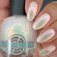 Victorian Varnish also brings us "Feline the Purride" for a Pride polish. "Feline the Purride" is a beautiful shimmery base with pink/gold shifting shimmer and micro rainbow flakies that dance all through the rainbow. Can also use a topper over your favorite cremes. 