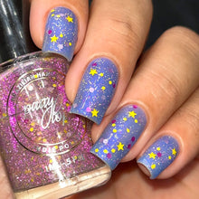 Indie Polish by Patty Lopes continues the series inspired by Emily in Paris with "Our Tours" which is a topper that has a mix of matte glitters and pink reflective glitters, and "Best Friend" which has a blue jelly base with purple, pink aurora shimmer.