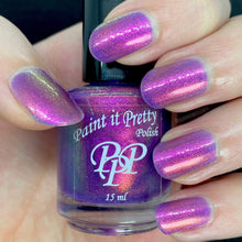 Paint it Pretty Polish begins a new series inspired by Looney Tunes with "Don't Call Me Doll" which is a purple based shimmer polish with shifts thru pink orange gold and green, and is inspired by Lola Bunny.