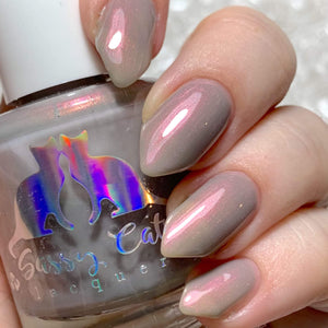 Sassy Cats Lacquer continues the series inspired by Nintendo Games with "Knight" which is a light grey with extreme pink shimmer, and is inspired by Hollow Knight.