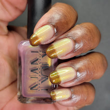 "The Crimson Vows" is a clear to red to deep crimson thermal polish with shimmers of Gold, green, orange and red.

15ml Bottle