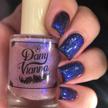By Dany Vianna continues their 'Fruits Basket' theme with "The Prince Yuki" and "Year of the Rat," both inspired by Yuki Sohma.

"Prince Yuki" is a sheer Grey jelly base with grey micro holographic glitters and red reflective glitters.

"Year of the Rat" is a mix of blue to violet aurora shimmer and flakes with red reflective glitters.

11ml Bottles

100 Cap