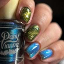 "We Have Never Run From a Wave Battle" has a dark blue jelly base with four point gold holo stars, gold galaxy glitter and a gold magnetic effect.

"Megumi's Warning" has a dark sheer base topper with blue to turquoise magnetic effect.

11ml Bottles