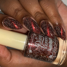 "Queen of the Castle" is a red magnetic shade with silver reflective glitters.

11ml Bottles