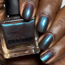 "Seattle Freeze" is a brown blue with blue/purple shimmers.

15ml Bottle