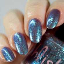 Pahlish continues their 'Stardew Valley' series!

"Moonlight Jellies" is a sheer taupe packed with iridescent blue/aqua flakes.