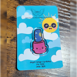 Angel Wings Creations begins a new "Eras" theme, beginning with Summer!  Our pins are entering their "Summer era" this month with a beautiful pink color and a cap with clouds and sun. The pin has its usual heart shape backing and sprinkle of holo glitter and measures 1.5".