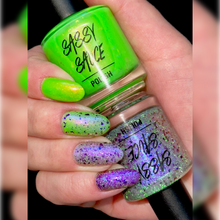 "Transparent" is a neon green with a golden/red/ copper shimmer and multi shifting ghost flakies.  "Express Yourself" - There is a lot going on in this bottle!!! A smokey base with a glowy red/purple shimmer, reflective glitter, ghost and UCC flakies. It can be used as a topper to transform your mani into bling or 2-3 coats on its own.   15ml Bottles