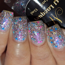 "Holo Lights" has a light tinted blurple base, with a cotton candy glitter mix, and holographic flakes.

15ml Bottle