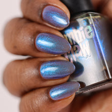 Zombie Claw continues their 'Powerpuff Girls' series with a polish inspired by Chemical X!

"Chemical Xtreme" is a sheer brown base with electric blue shimmer that glows in the dark blue.