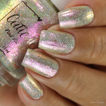 HHC is thrilled to welcome back Cuticula Nail Lacquer who will be doing a series inspired by Dreamlight Valley with "Dreamlight" which is a holographic flake base with pink/gold/green shimmer, yellow/purple/pink/green large particle shimmer, pink/gold/green small iridescent flakes, and small pink/purple g