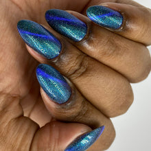 "Eternal Mirage" is a deep blue magnetic with turquoise/green aurora shimmer and holographic pigment. It evokes the enigmatic beauty of a mirage that never fades, revealing layers of charm and mystery with every movement.

10ml Bottle