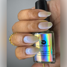 "He's So Unusual" has a light lemon base with a blue/pink/purple shift.

11ml Bottles