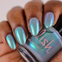 Pahlish continues their 'Sailor Moon' series with a polish inspired by Sailor Mercury!

"Sailor Mercury" is a cool taupe grey packed with fine teal/aqua/blue shimmer.