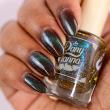 By Dany Vianna continues their 'Fruits Basket' series with a polish inspired by Yuki and Tohru's garden.  "Secret Base" has a brown jelly base filled with green reflective glitters and blue magnetic pigment.  11ml Bottle