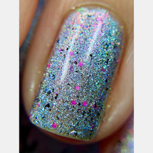 "Cheers to 11 Years" is a linear holo with a golden pink shimmer, hot pink micro glitter and black flakes.

15ml Bottle