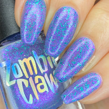 "Comforting Lavender" has a soft lavender base that shifts blue-red with purple metallic flakies.


13ml Bottle